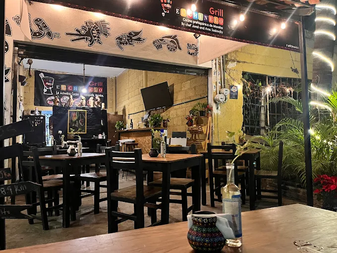 Street dining scene in Versalles Puerto Vallarta with colorful restaurants and delicious Mexican food.