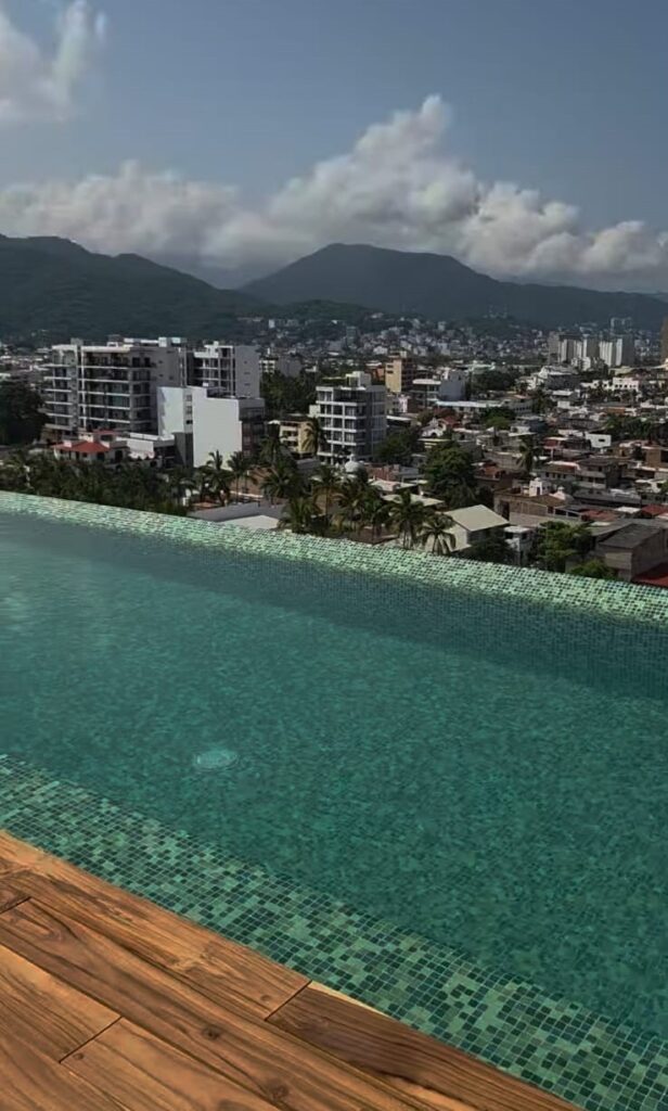 Rooftop infinity pool overlooking Versalles Puerto Vallarta real estate investment area