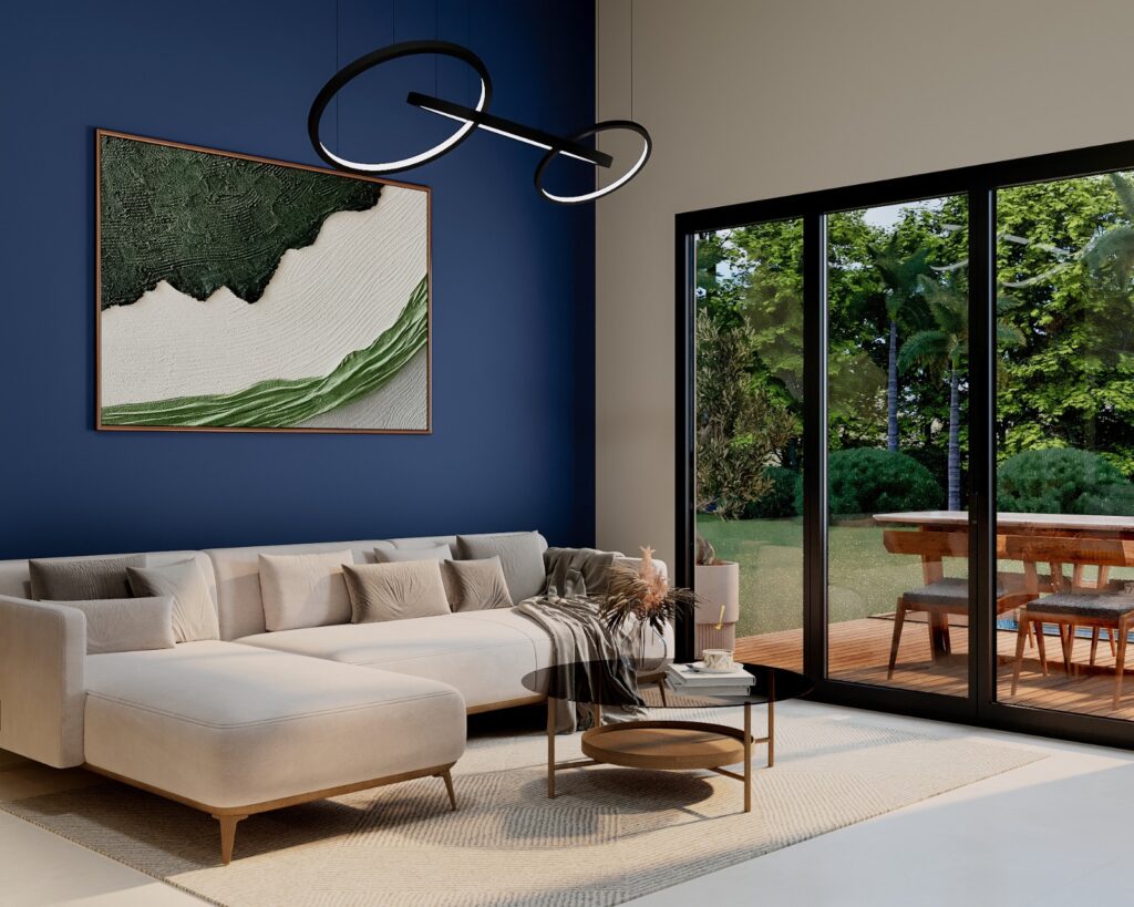 Modern coastal-inspired living room with large glass doors, natural light, contemporary furniture, and indoor-outdoor design