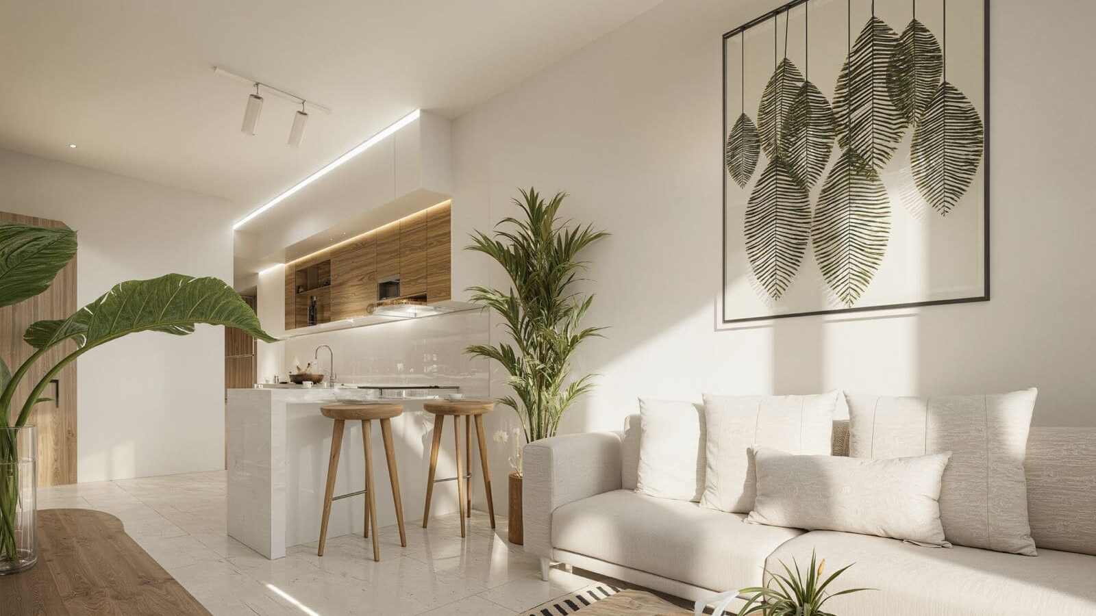 Modern open-concept living room and kitchen in a luxury Puerto Vallarta condominium.