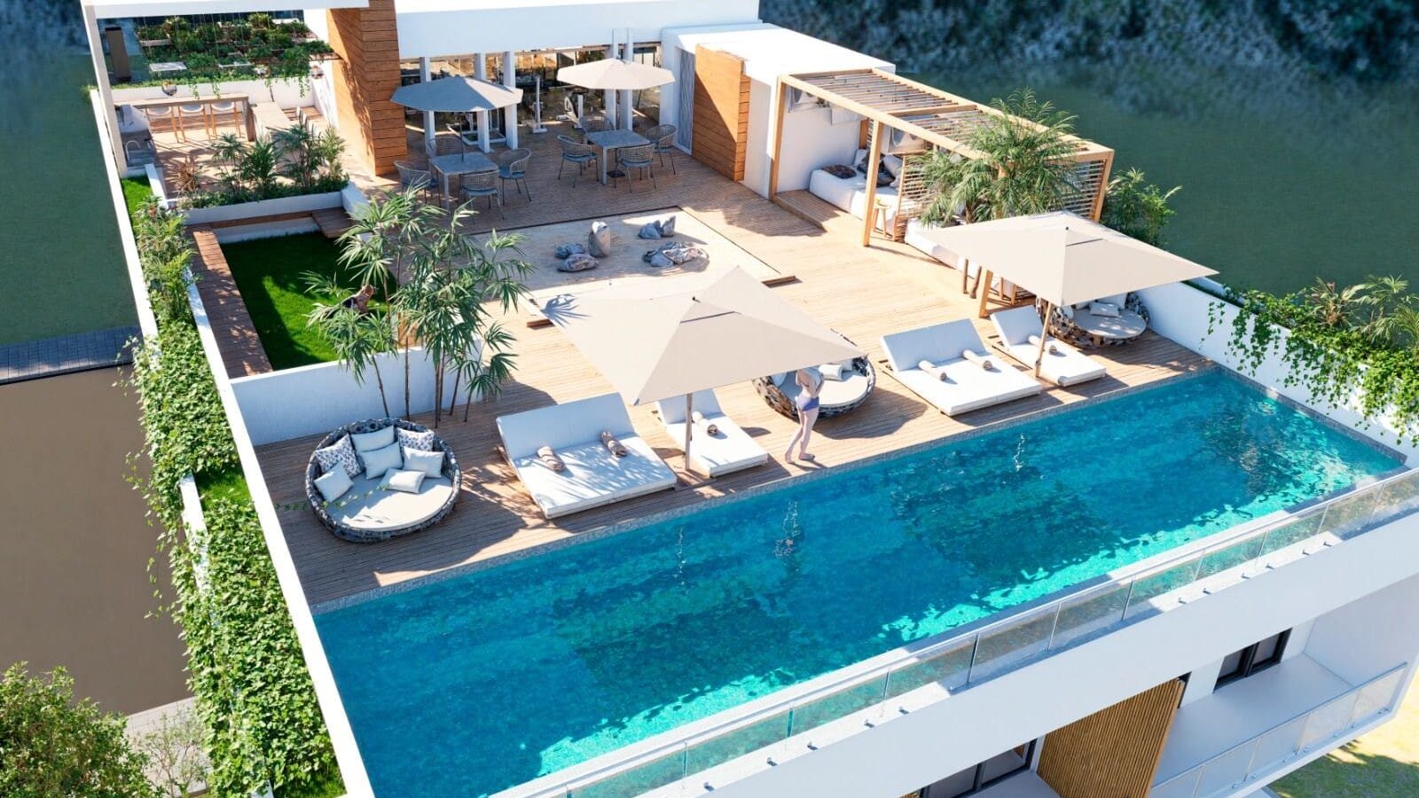 Rooftop infinity pool and luxury lounge area at a condominium in Puerto Vallarta.