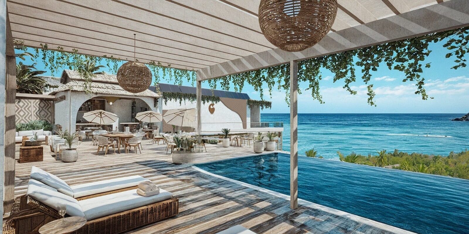 Luxury rooftop infinity pool overlooking the Pacific Ocean in Puerto Vallarta.