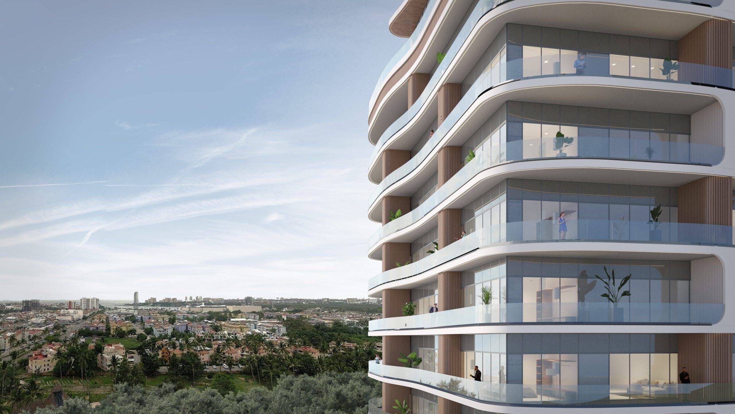 Contemporary luxury condominium building with curved balconies in Puerto Vallarta, Mexico.