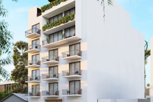 Modern building in Puerto Vallarta offering luxury pre-sale properties with ocean views.
