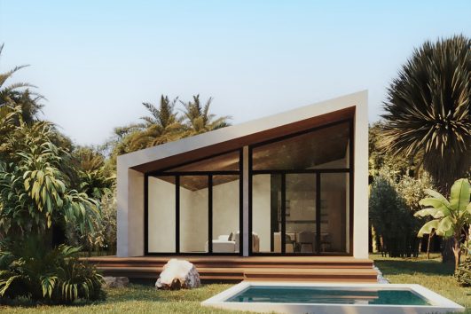 Modern luxury villa with large glass windows and private pool in a tropical setting