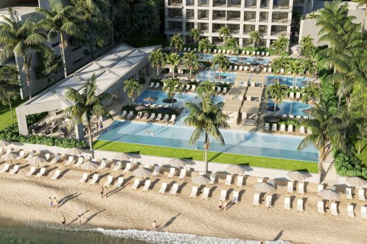 Beach club at Tridenta beachfront building with luxury amenities and ocean views.