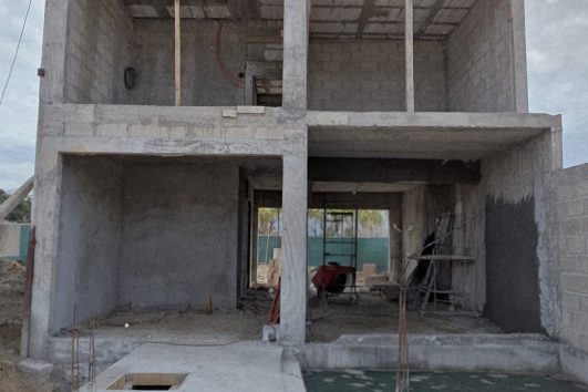 Modern two-story house under construction representing pre-sale real estate development in Puerto Vallarta